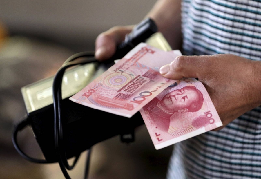 البنك المركزي الصيني يحدد سعر اليوان عند 6.7898 دولار